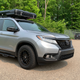 Illustration for article titled I Slept on the Roof of a Honda Passport to Prove That Hotels Are for Suckers